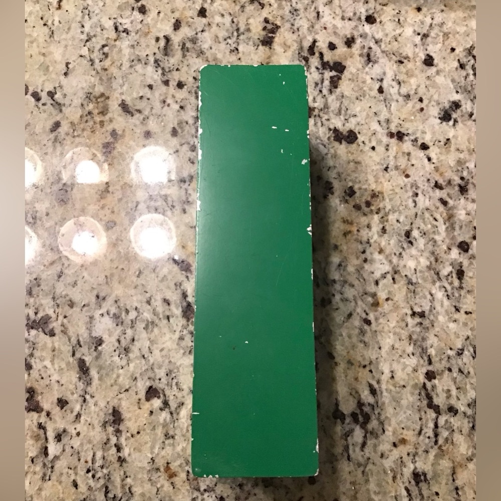 Vintage marquee letter I in green